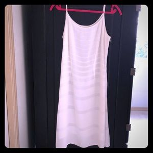 White knee-length dress.